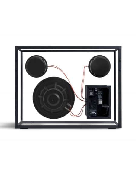 Enceinte rectangle transparente avec hauts-parleurs noirs vue de derrière