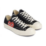 Paire de baskets basses noires et blanches