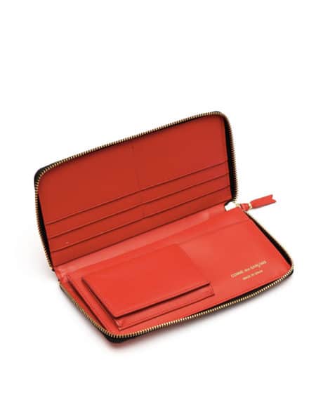 Portefeuille rouge avec zip ouvert
