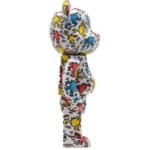 Figurine Bearbrick 1000% Keith Haring par Medicom Toy vue de profile sur fond blanc