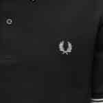 polo vert cdg x fred perry vue de détail