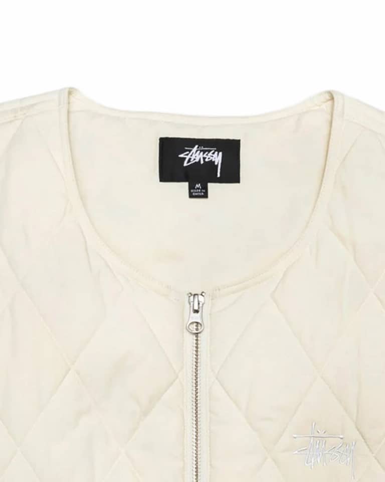 veste stussy diamond quilted de couleur creme vue de detail